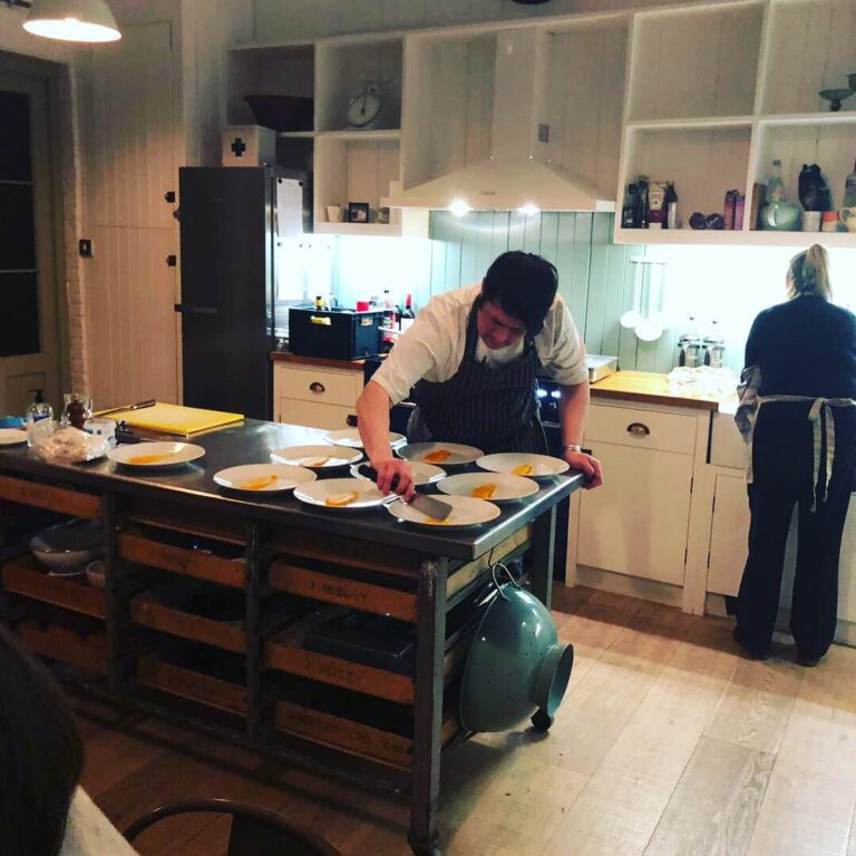 Adam plating up at a dinner party