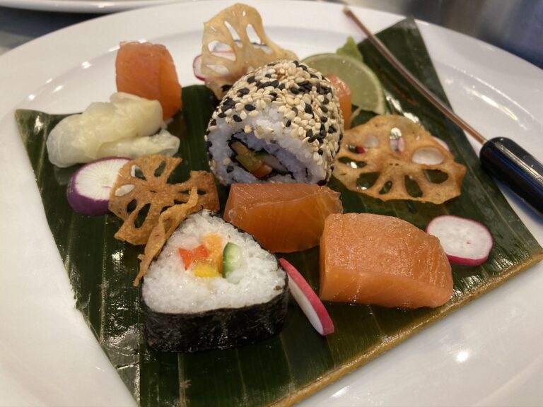 Citrus cured salmon with sushi rice rolls & lotus root